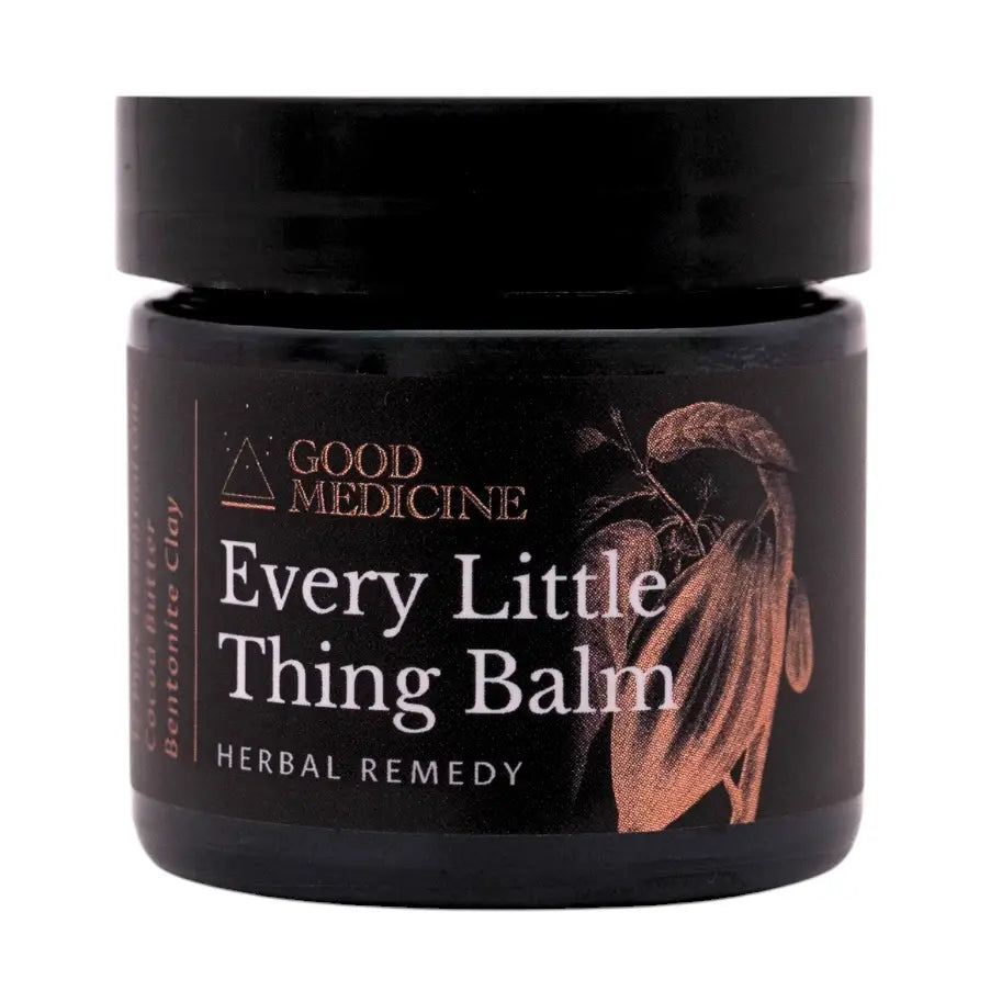 Black jar of 'Every Little Thing Balm' by Good Medicine on a white background