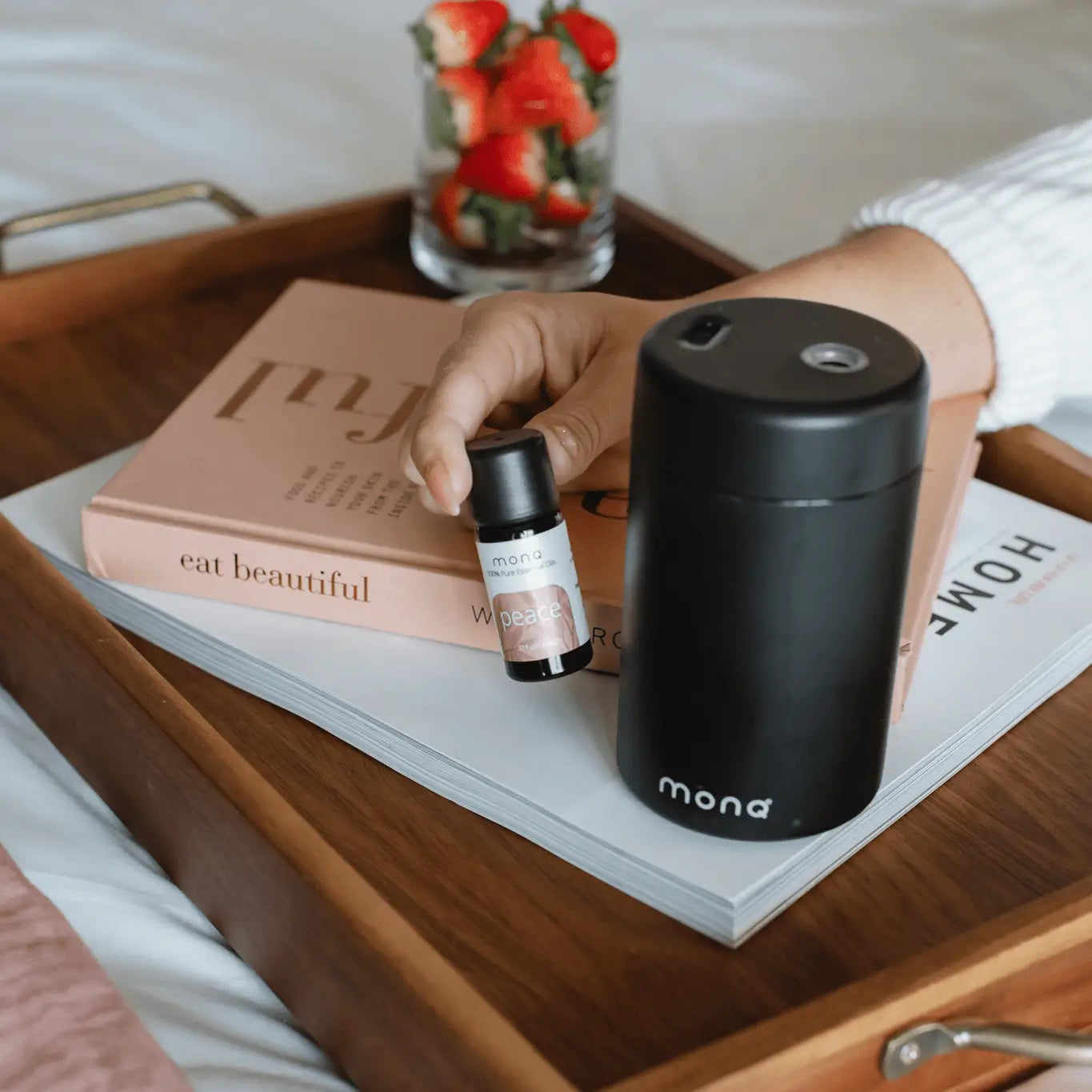 lifestyle-book-diffuser-Peace essential oil blend 10ml MONQ on a wooden tray