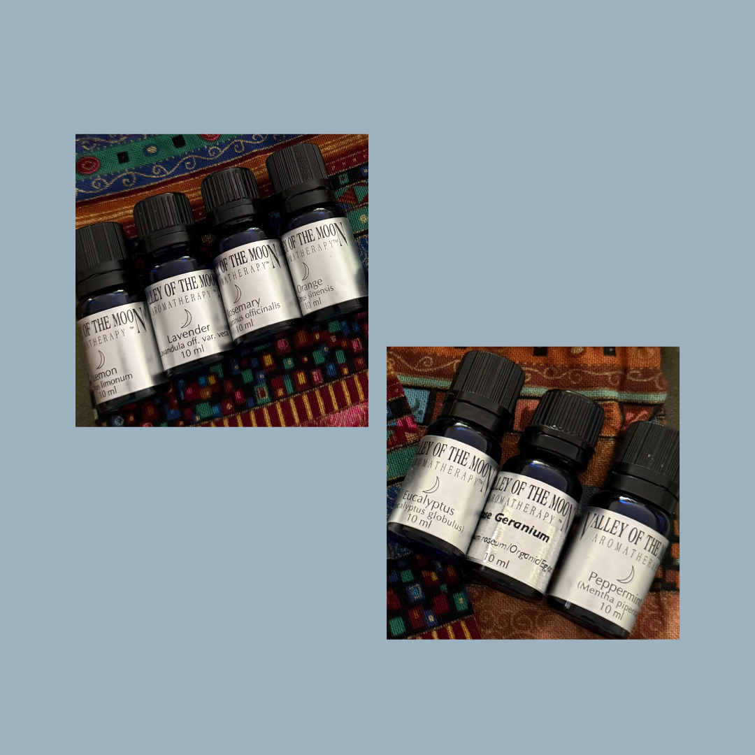 Bottles of Valley of the Moon aromatherapy essential oils on a colorful woven mat with a blue background.